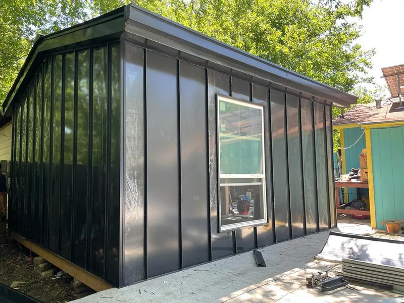 Black standing seam metal wall panels for Metal Roof Installation in Waltham