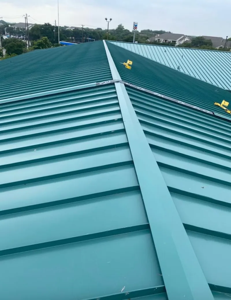 Green commercial metal roof ridge and valley for Metal Roof Repair in Waltham
