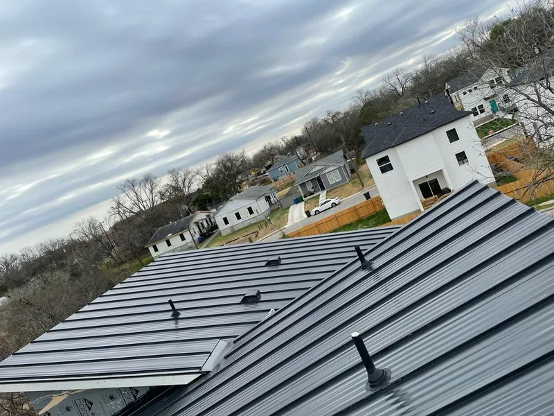 Standing seam metal roof panels with vents for Skylight Repair in Waltham